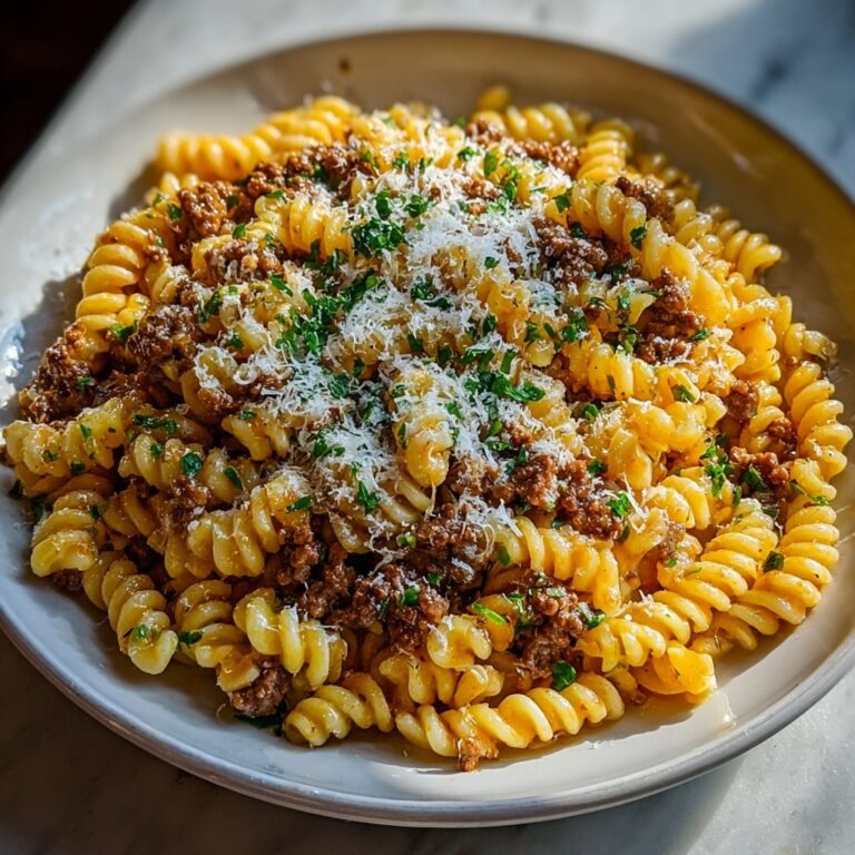 Cheesy Garlic Twisted Pasta with Cajun Ground Beef Recipe